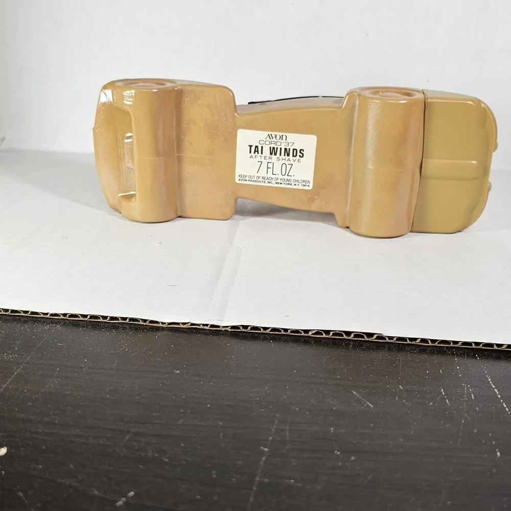 Avon Cord 37 Car Bottle. Tan Tai Winds After Shave Bottle
